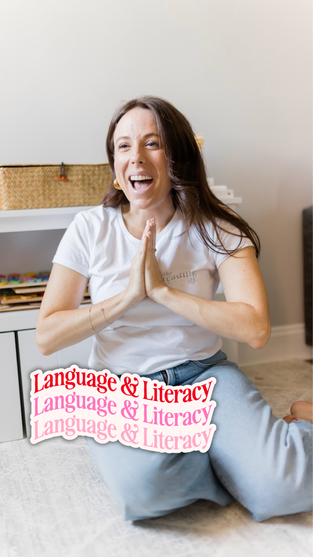 Elizabeth laughing with the Language & Literacy sticker